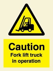 Caution Fork lift truck in operation